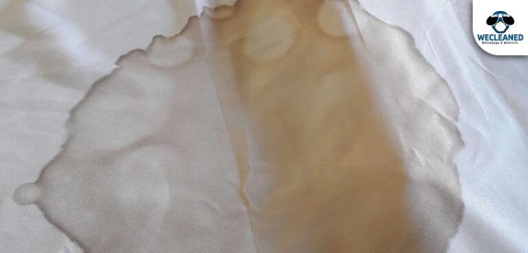Comment enlever tache cire sur nappe?